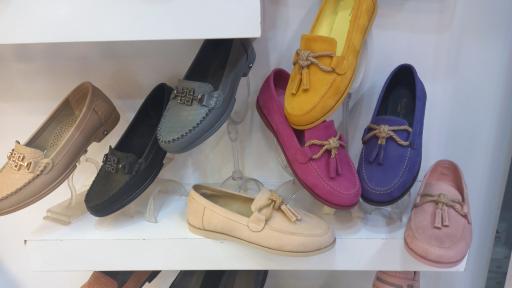 عکس تعمیرات و فروش کیف و کفش هخامنش