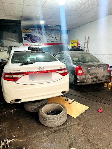 عکس تعمیرگاه  و فروشگاه لوازم یدکی اتومبیل مدرن