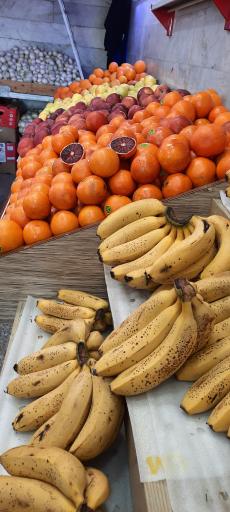 عکس میوه فروشی کارگر