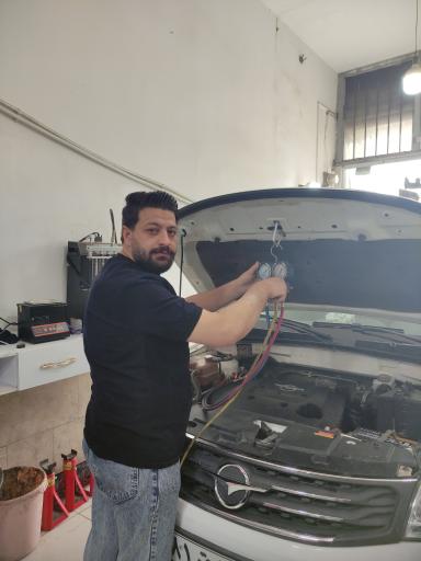 عکس برق خودرو و دیاگ و شارژ کولر موسی پور