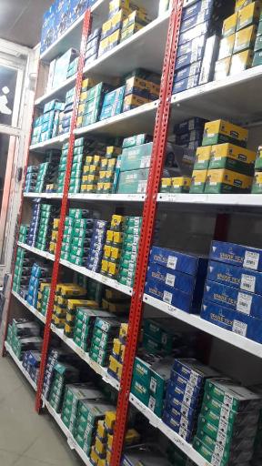 عکس دنیای باطری و مرکز پخش لنت اسَد