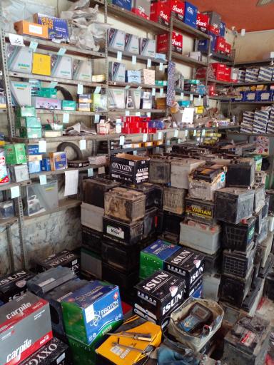 عکس دنیای باطری و مرکز پخش لنت اسَد