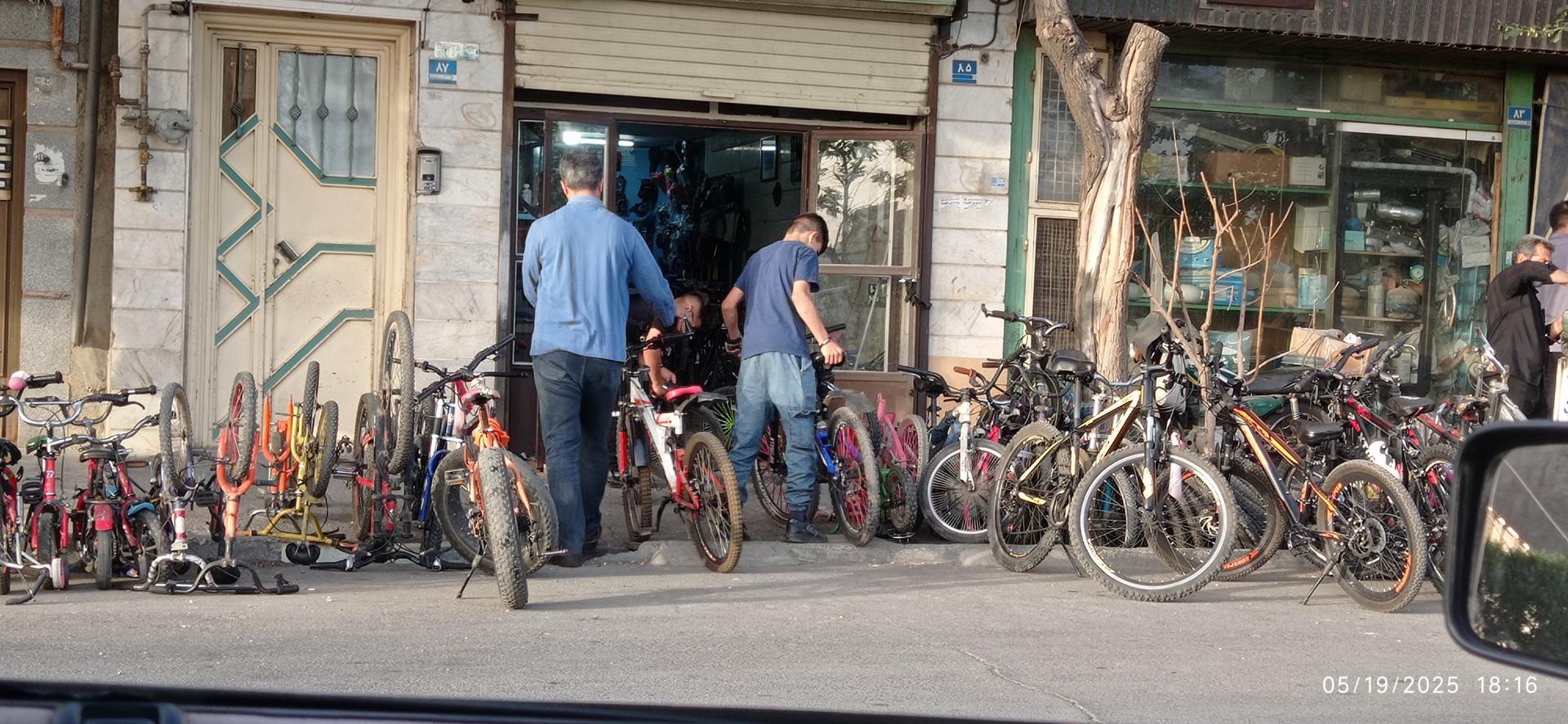 عکس تعمیر دوچرخه فارسیجانی