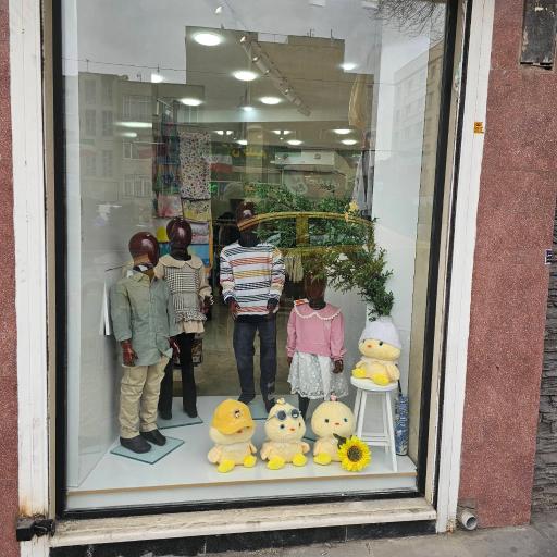 عکس فروشگاه پوشاک جوجوپوش