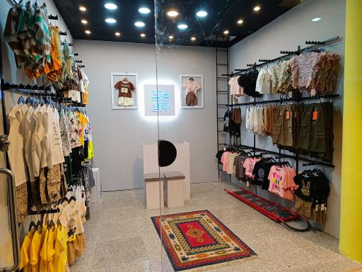 عکس پوشاک بچگانه وال 