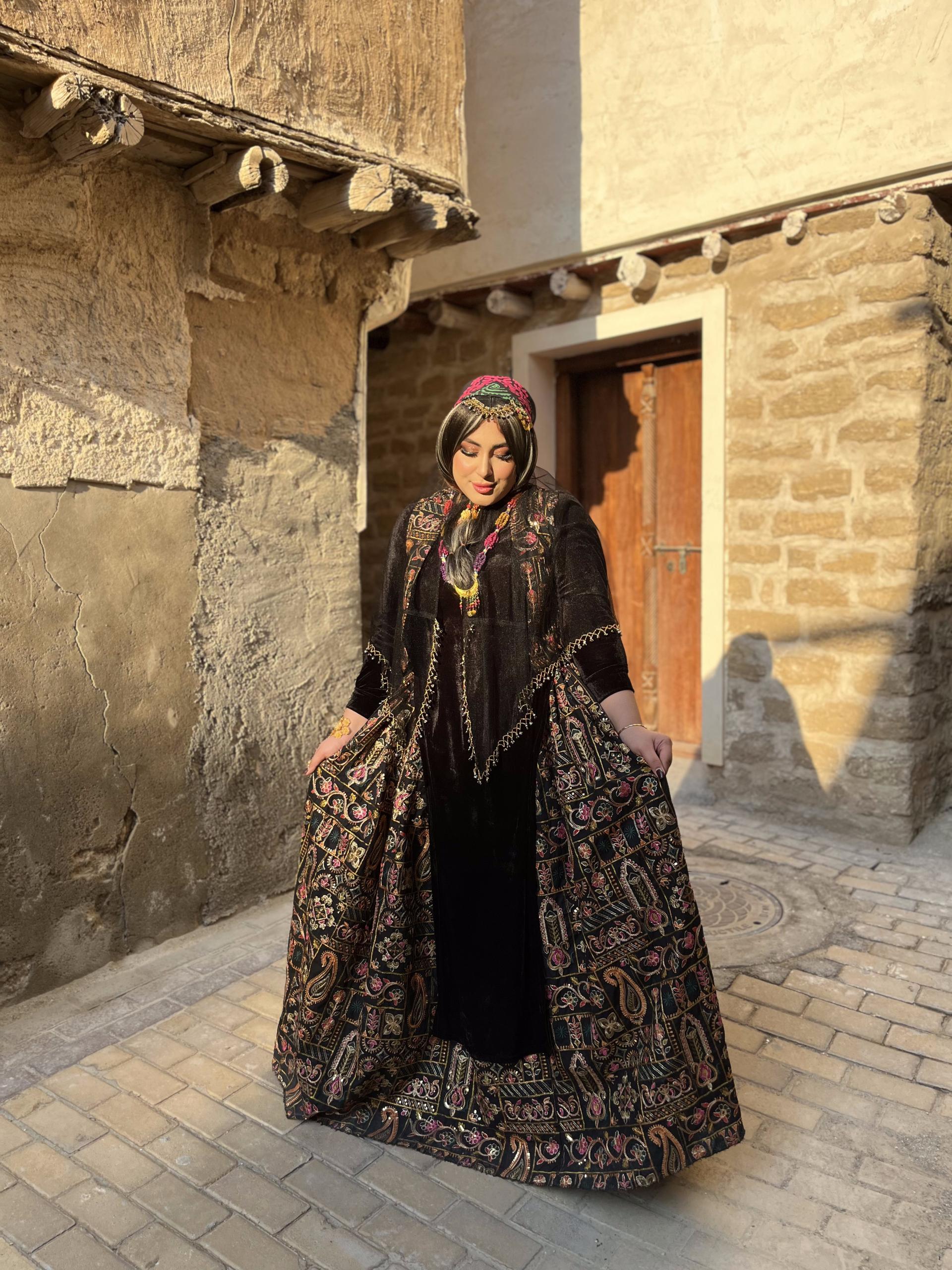 عکس مزون لباس محلی بابونه