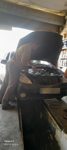 عکس تعویض روغن و اتو سرویس محمد