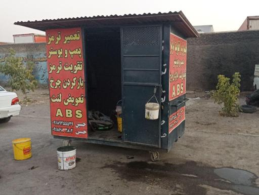 عکس تعمیر ترمز انواع خودرو حسن و حسین 