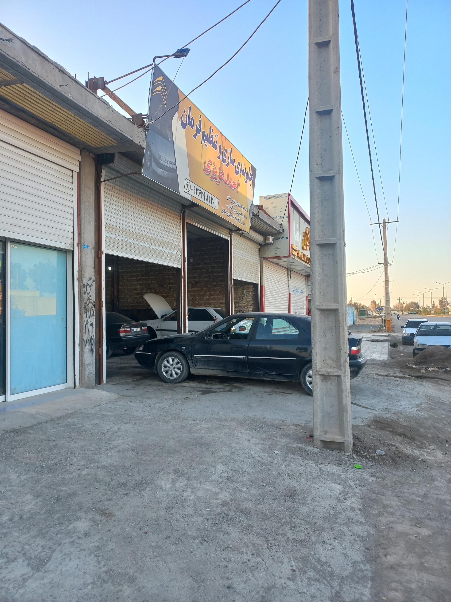 عکس جلوبندی و تنظیم فرمان احمد عزیزی