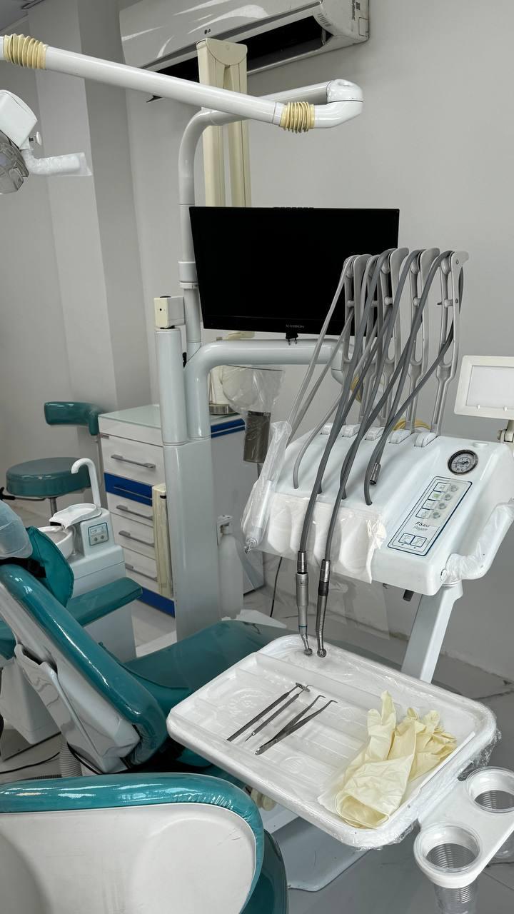 عکس کلینیک دندانپزشکی دکتر معزی