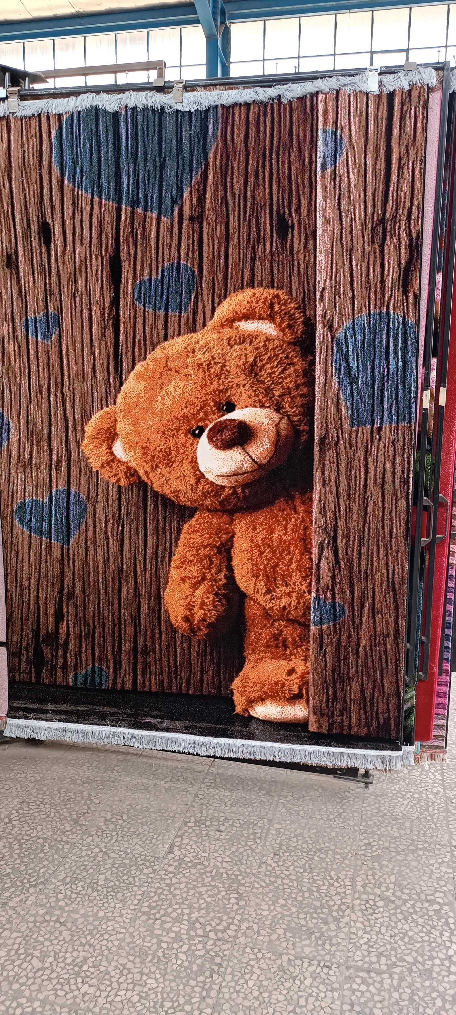 عکس فروشگاه گلیم و موکت هادی