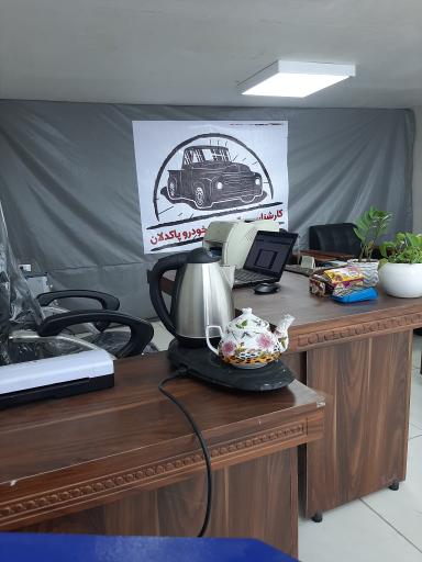 عکس پولیش و کارشناسی رنگ خودرو پاکدلان