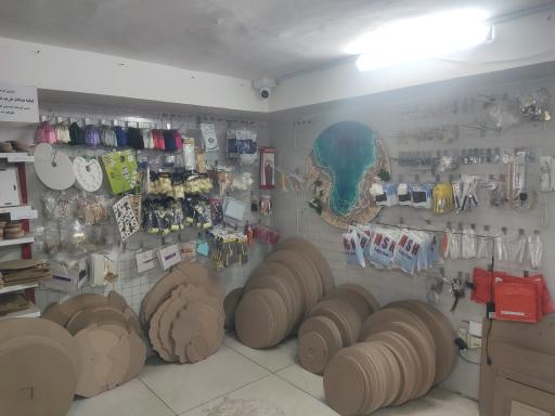 عکس فروشگاه هنری کافه رزین