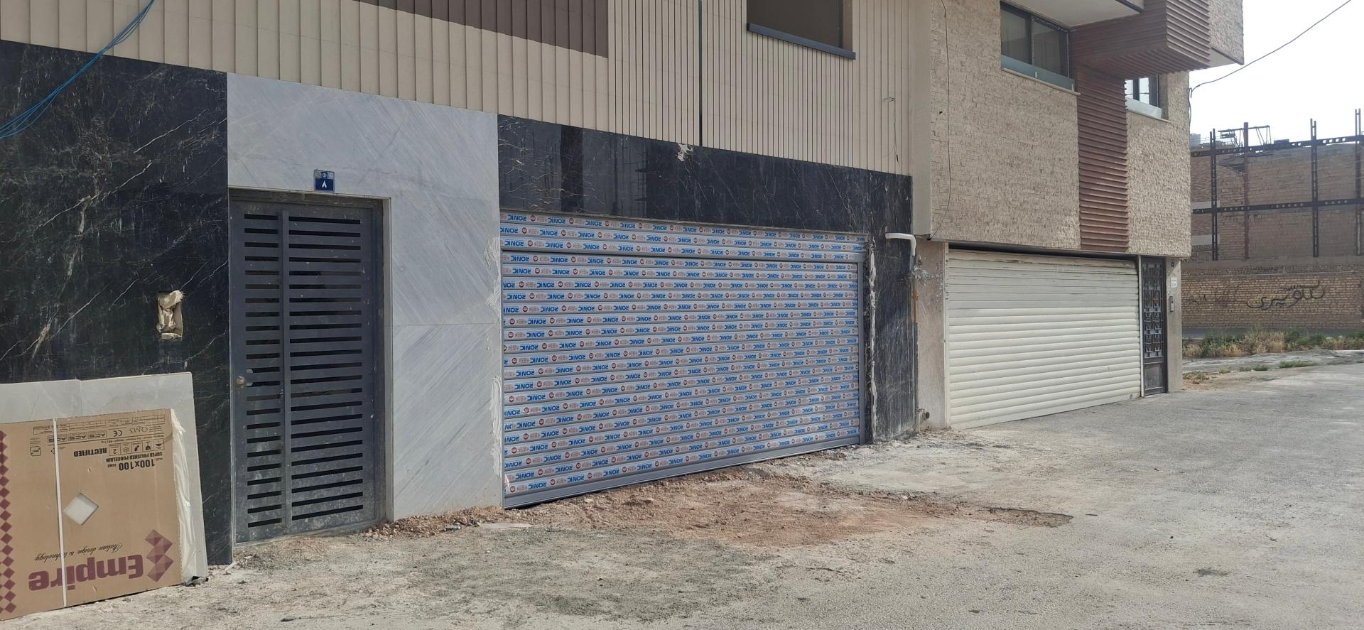 عکس تعمیر تخصصی درب برقی