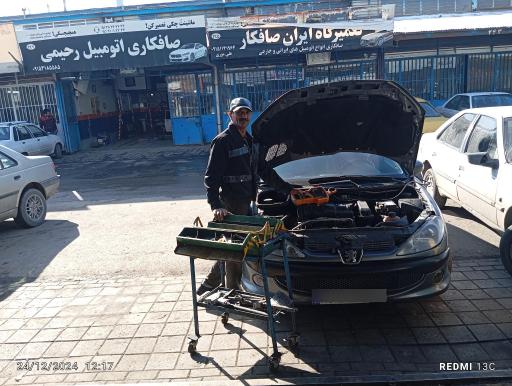 عکس تعمیرگاه خودرو اختراعی