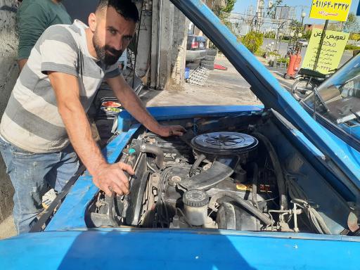 عکس تعمیرگاه نیسان امید عزیزی