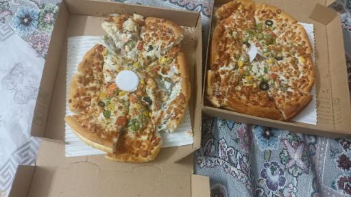 عکس پیتزا دهکده