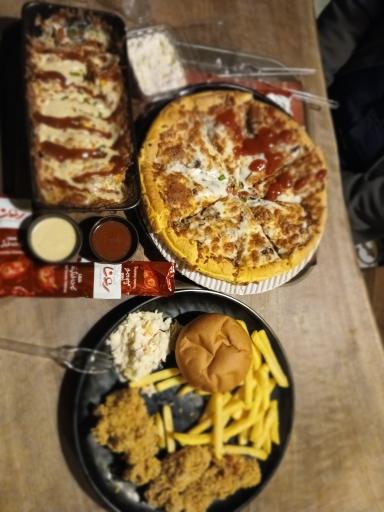 عکس پیتزا دهکده