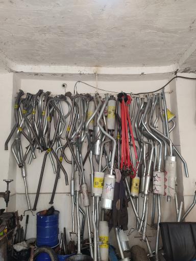 عکس اگزوز سازی جوشکاری و آپارتی رضا 