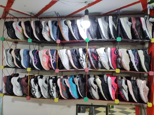 عکس فروشگاه کفش تک