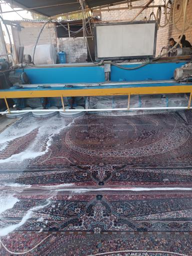 عکس قالیشویی باران