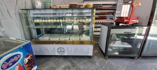 عکس فروشگاه لبنیات طلانوش