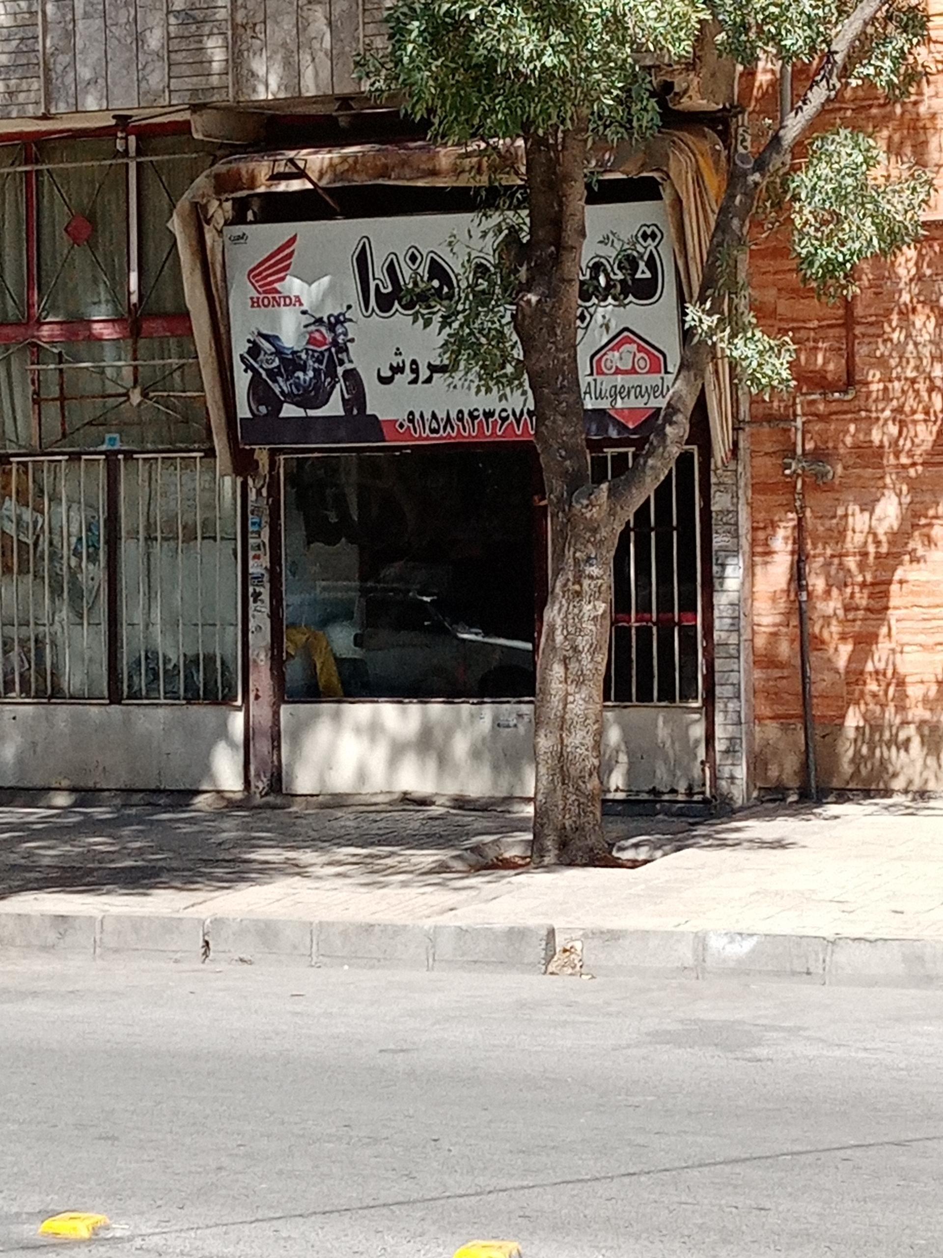 عکس تعمیرگاه هندا