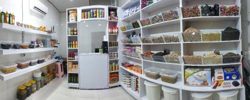 عکس فروشگاه دنیای مزه ها