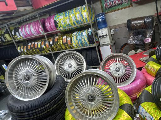 عکس لاستیک فروشی و بالانس مهدی