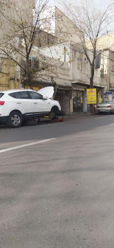 عکس تعمیرگاه و جلوبندی روح الله