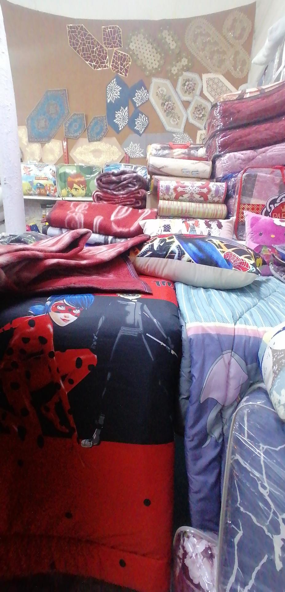 عکس تولید روتختی و رومیزی