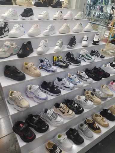 عکس فروشگاه کفشدوزک 