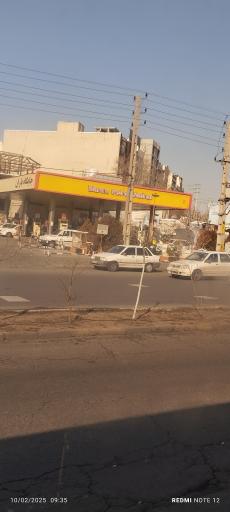 عکس پمپ بنزین باران