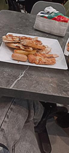 عکس پیتزا سلف سرویس فودینو 