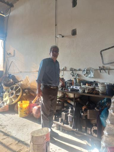 عکس مکانیکی بیل برزگر 