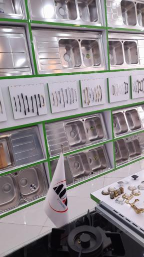 عکس فر‌وشگاه حسینی