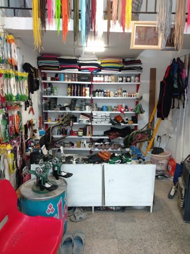 عکس مرکز تخصصی تعمیرات کیف و کفش اورجینال