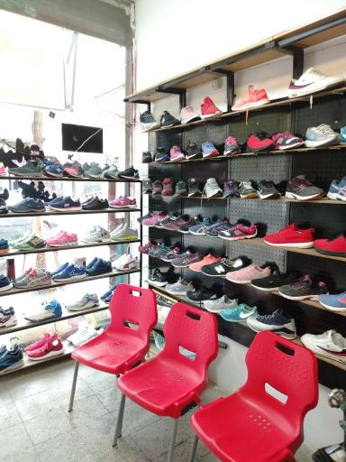 عکس مرکز تخصصی تعمیرات کیف و کفش اورجینال