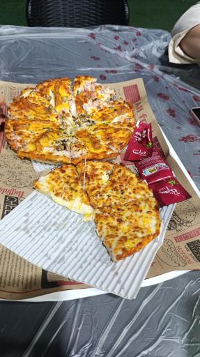 عکس پیتزا طهران پیانو