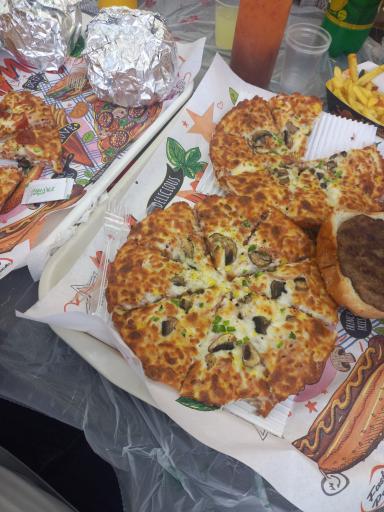 عکس پیتزا طهران پیانو