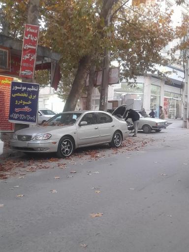عکس تنظیم موتور و تیونینگ حاتمی