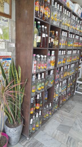 عکس عطاری گیاهان دارویی گل سرخ