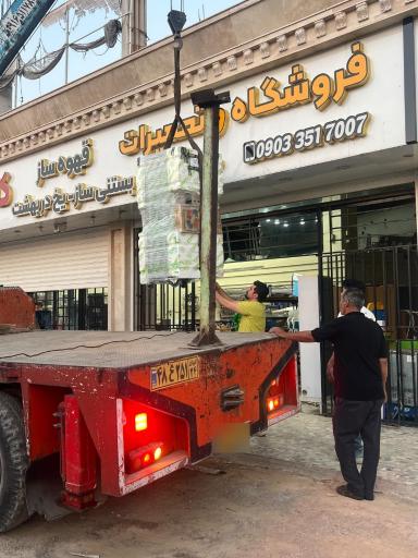 عکس کارگاه تعمیرات دستگاه اسپرسو کاوندی 