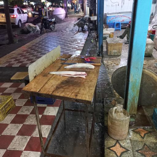 عکس بازار ماهی فروشان