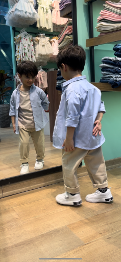 عکس فروشگاه لباس کودک سانلی کیدز