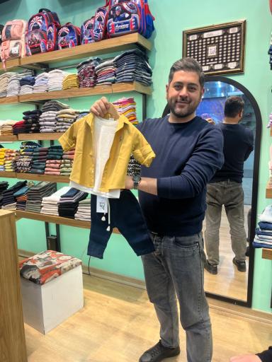 فروشگاه لباس کودک سانلی کیدز