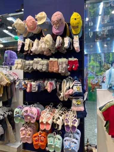 عکس فروشگاه لباس کودک سانلی کیدز