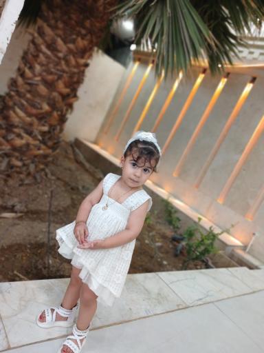 عکس فروشگاه لباس کودک سانلی کیدز