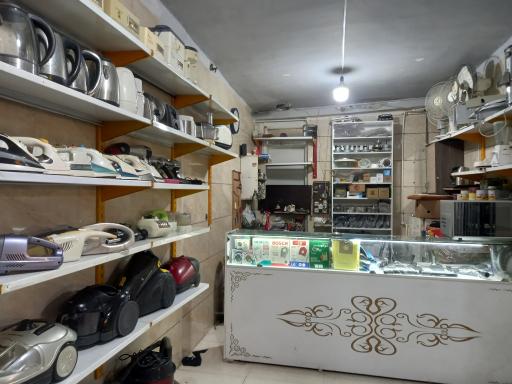 عکس تعمیرات لوازم خانگی ولیعصر