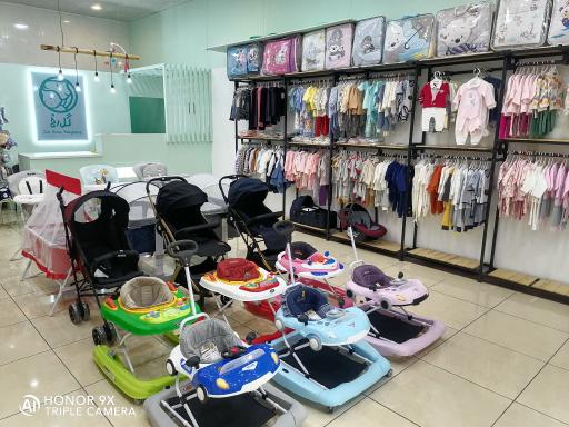 عکس فروشگاه سیسمونی گل رخ